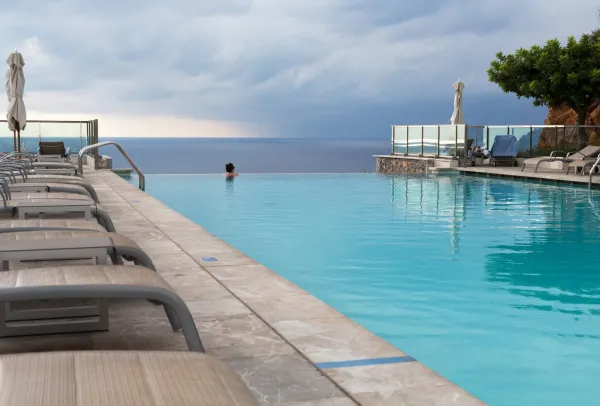 girl-in-a-swimming-pool-with-sea-views-2024-09-14-14-57-05-utc-691596f842c86