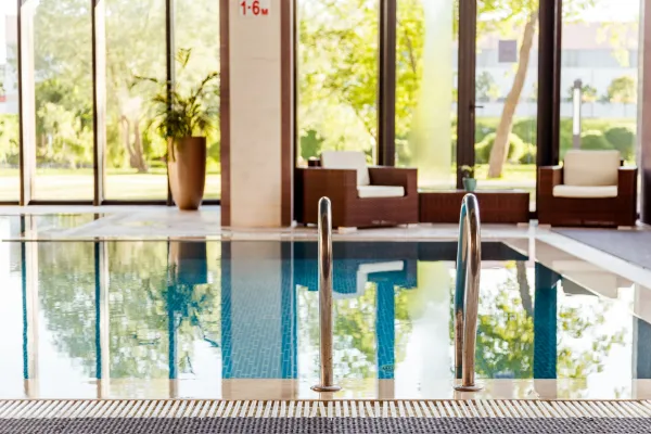 grab-bars-ladder-in-the-blue-swimming-pool-2025-02-12-05-21-44-utc-691596f6881e4