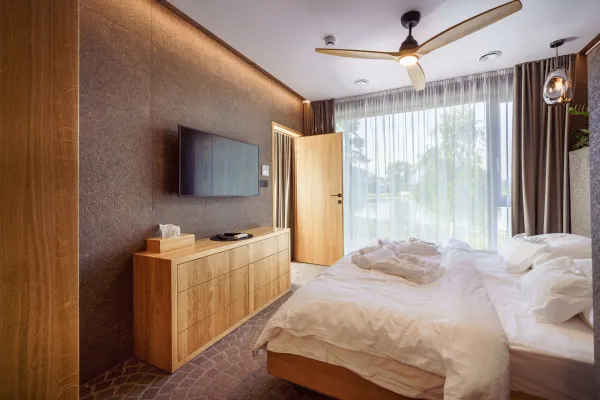 interior-of-modern-bedroom-suite-in-luxury-hotel-2024-10-21-09-45-08-utc-69158b3ed1e42