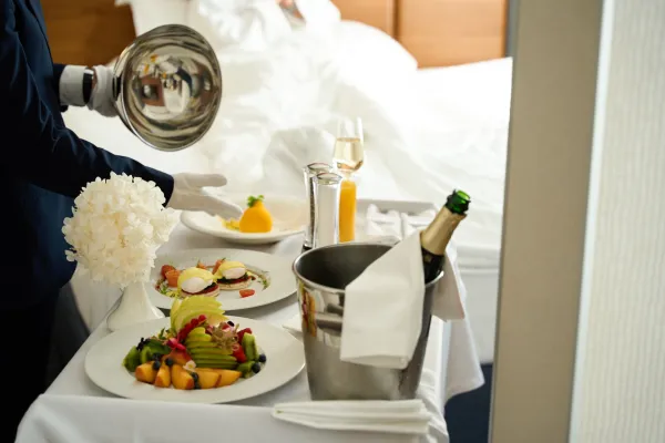 serving-breakfast-in-the-room-with-champagne-on-se-2024-10-18-10-44-17-utc-691597db72b61