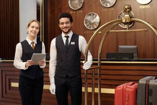 two-young-elegant-employees-of-luxurious-hotel-wai-2026-01-09-08-16-26-utc-696a20e3c8e86