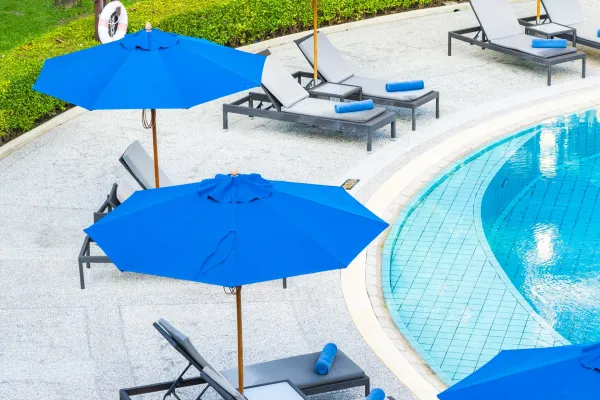 umbrella-and-chair-around-outdoor-swimming-pool-2024-09-14-01-54-40-utc-691596f4b7b15