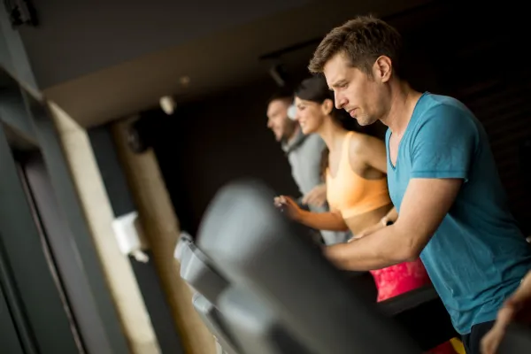 young-people-using-threadmill-in-modern-gym-2025-02-21-19-41-14-utc-69159631586ba